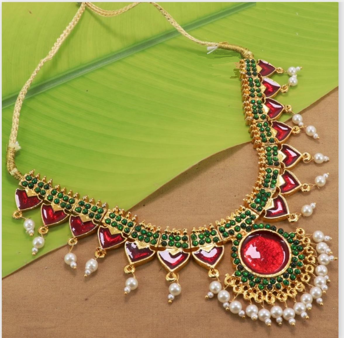 https://www.excellis.co.in/dance_jewlry//public/storage/photos/1/Products/EnamelChoker_Red__97737.jpg