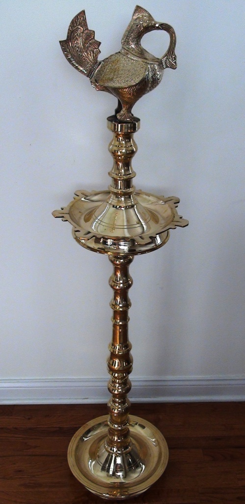 https://www.excellis.co.in/dance_jewlry//public/storage/photos/1/Products/Nilavilakku-60in-Big__92943.JPG