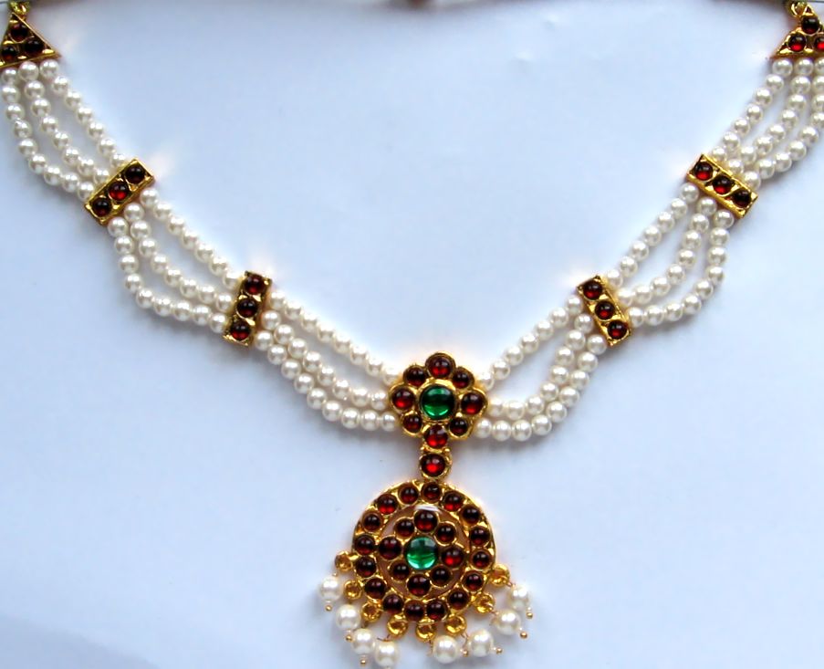https://www.excellis.co.in/dance_jewlry//public/storage/photos/1/Products/PearNecklace__88335.jpg