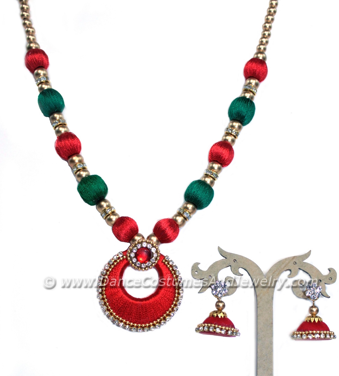 https://www.excellis.co.in/dance_jewlry//public/storage/photos/1/Products/Red_and_green_Thread_jimikki_csr__68136.jpg