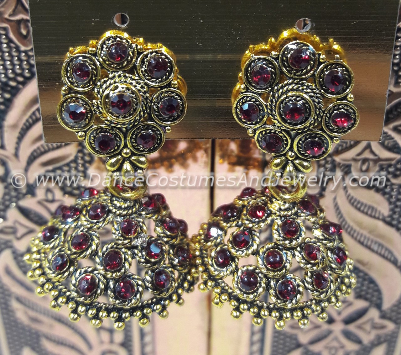 https://www.excellis.co.in/dance_jewlry//public/storage/photos/1/Products/Small_maroon_stone_jimikkiCSR__92248_1__46235.jpg