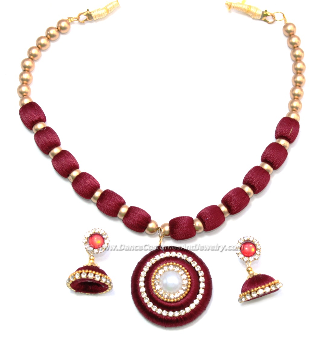 https://www.excellis.co.in/dance_jewlry//public/storage/photos/1/Products/Thread_necklace_set_maroon01-smallDCAJ__95959.jpg