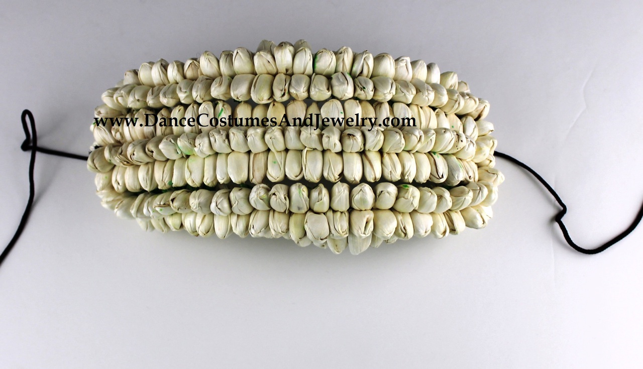 https://www.excellis.co.in/dance_jewlry//public/storage/photos/1/Products/WhiteCelluloseRs340_9RowsOval__53559.jpg