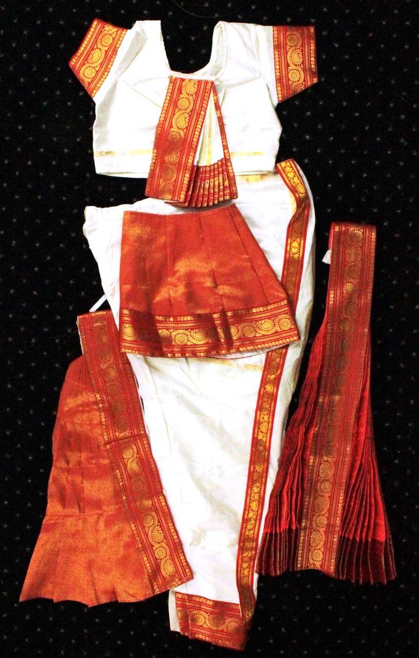 https://www.excellis.co.in/dance_jewlry//public/storage/photos/1/Products/WhiteMustard_Bharatanatyam_smal__35000.jpg
