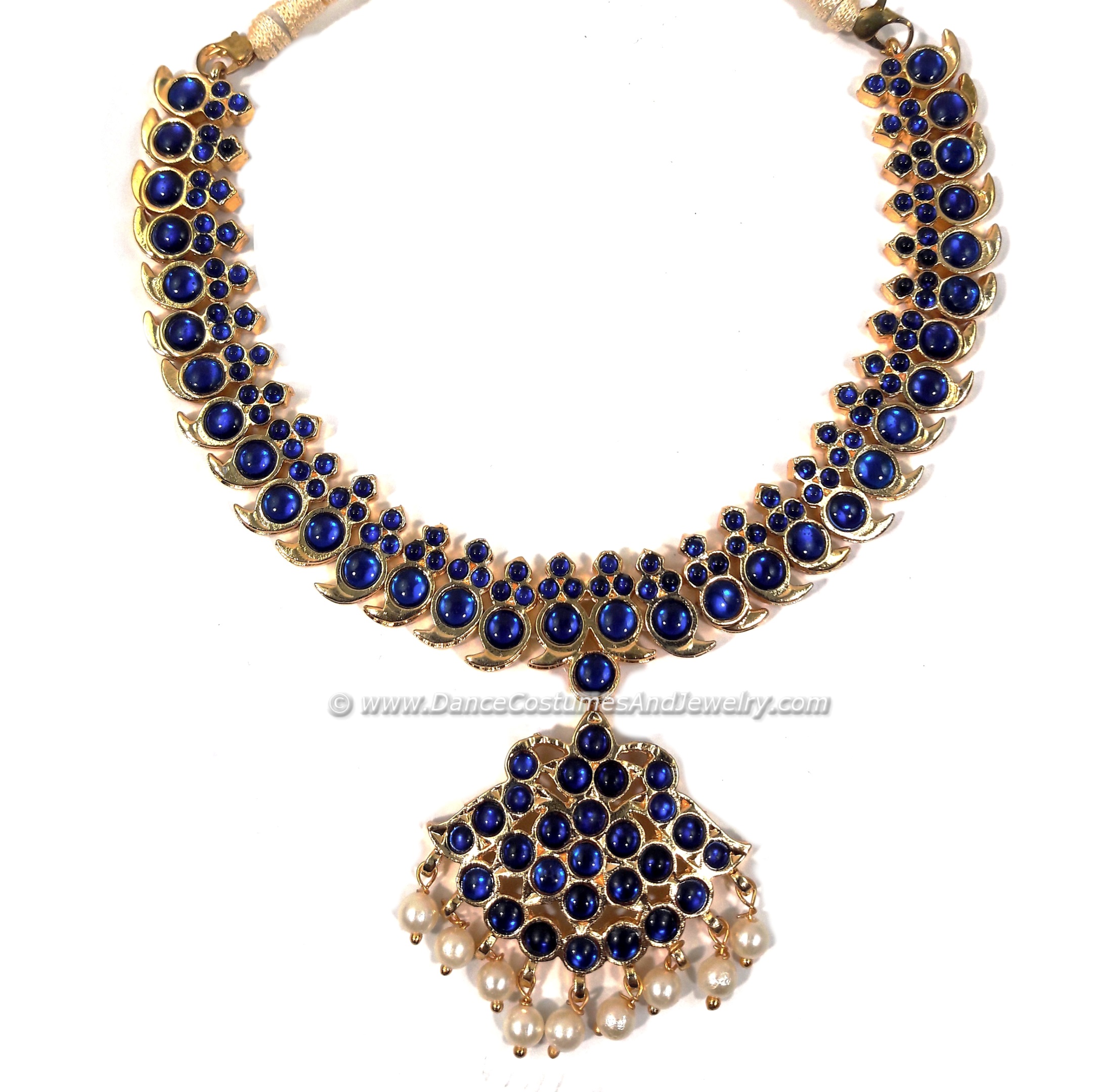 https://www.excellis.co.in/dance_jewlry//public/storage/photos/1/Products/blue_mango_necklace1003CSR-small__13084.jpg
