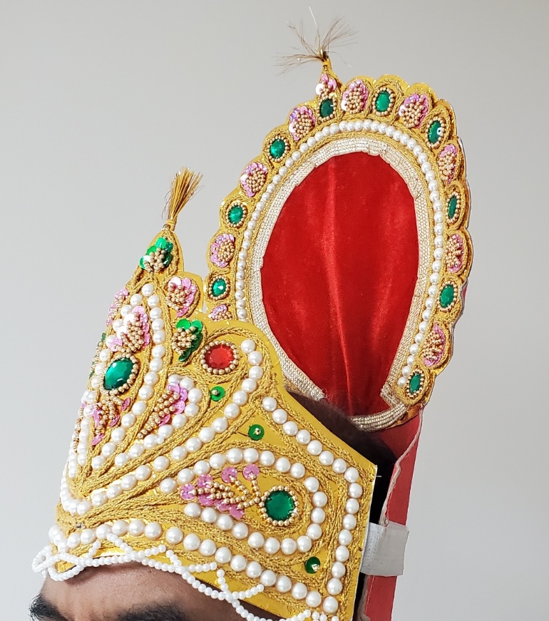 https://www.excellis.co.in/dance_jewlry//public/storage/photos/1/Products/person_wearing_crown__41002.jpg
