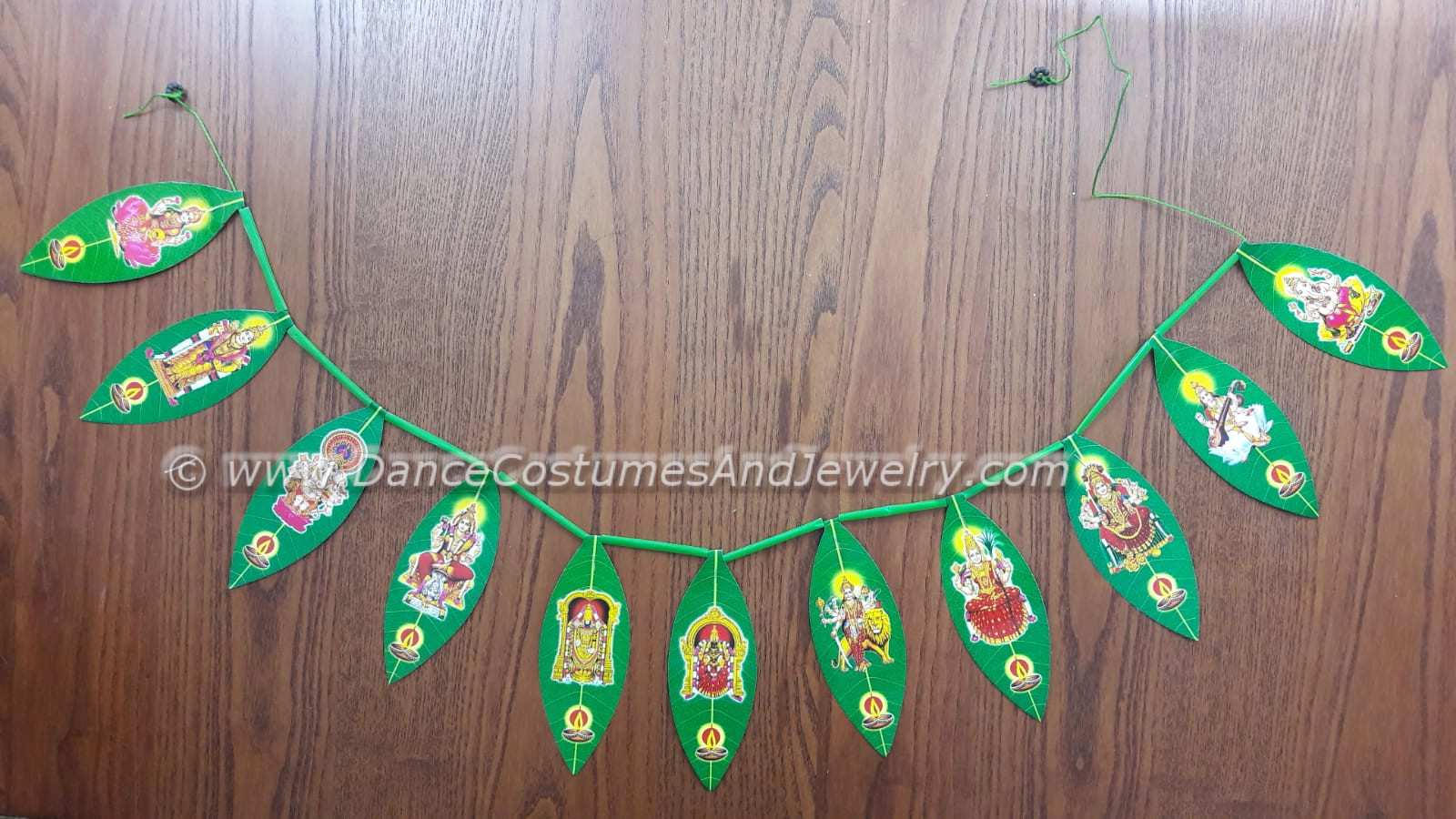 https://www.excellis.co.in/dance_jewlry//public/storage/photos/1/Products/thoran03__54199.jpg